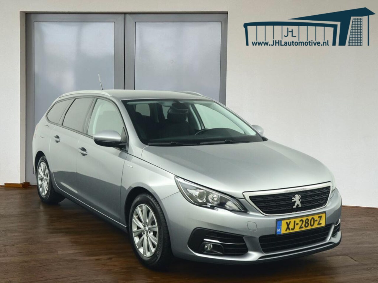 Peugeot 308 SW - 1.2 PureTech Allure*NAVI*ECC*PDC*CRUISE* - AutoWereld.nl