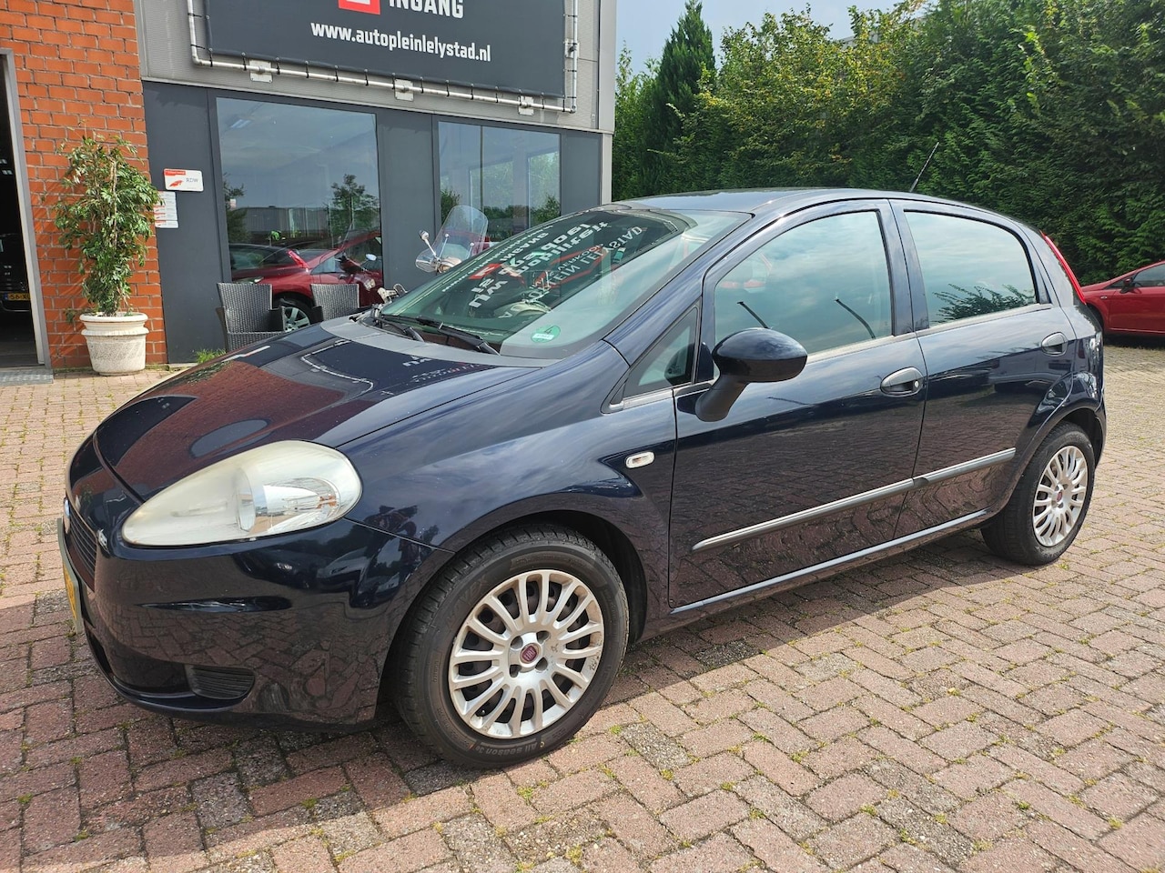 Fiat Punto Evo - 1.3 M-Jet Racing 5DRS AIRCO - AutoWereld.nl