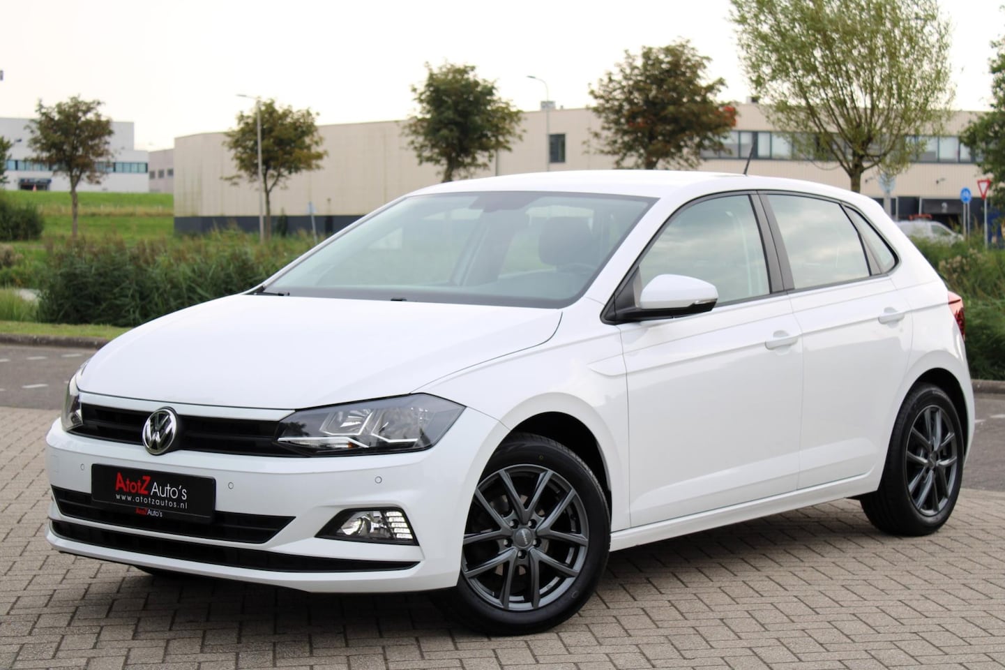 Volkswagen Polo - 1.0 Comfort l Airco l Navi l PDC l Carplay - AutoWereld.nl