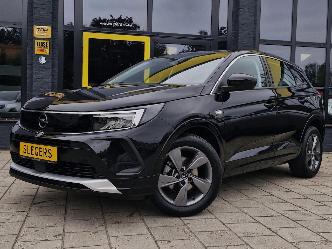 Opel Grandland - 1.2 Turbo Enjoy | Stoelverwarming | Stuurverwarming | Park. Sens. | Apple Carplay | Androi - AutoWereld.nl