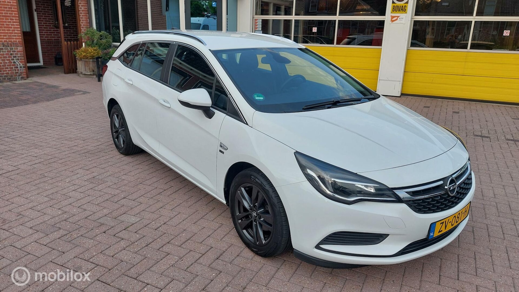 Opel Astra Sports Tourer - 1.6 CDTI 120 Jaar Edition 1.6 CDTI 120 Jaar Edition - AutoWereld.nl