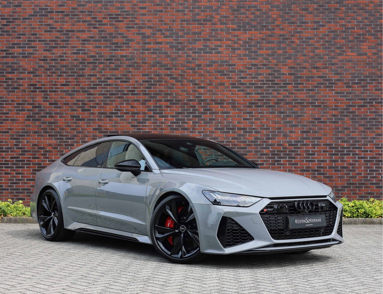 Audi RS7 - 4.0 TFSI Quattro *Dynamic Plus*Matrix*Rood Design pakket* - AutoWereld.nl