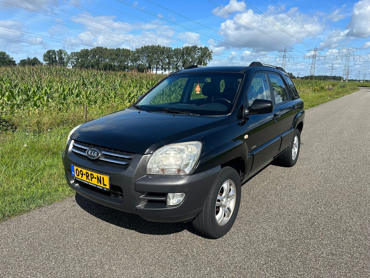 Kia Sportage - 2.0 CVVT Adventure 4WD AIRCO /TREKHAAK / 4X4 ! - AutoWereld.nl