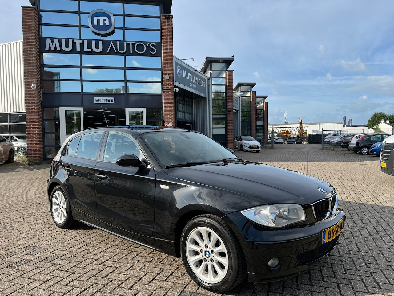 BMW 1-serie - 118i Business Line 5deurs Airco NAP APK - AutoWereld.nl