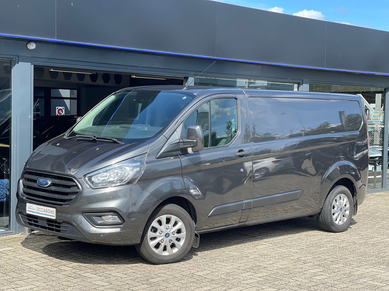 Ford Transit Custom - 320 2.0 TDCI L2H2 Trend AUTOMAAT/CAMERA/LED/ZIJDEUR/CRUISE - AutoWereld.nl