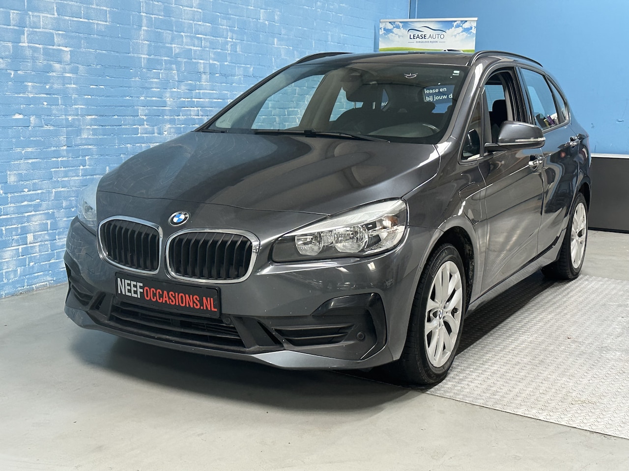 BMW 2-serie Active Tourer - 225xe iPerformance Executive Edition 4X4 CLIMA NAVI CRUISE PANO 1e EIGENAAR - AutoWereld.nl