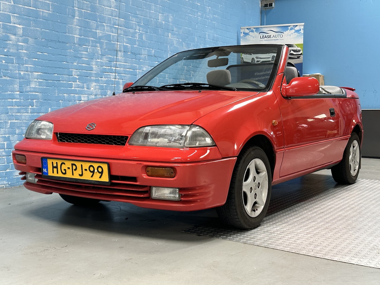 Suzuki Swift - 1.3 Cabrio Stuurbkr / Elk.spiegel / Apk tot 7-2026 Nieuwe Dak!!! - AutoWereld.nl