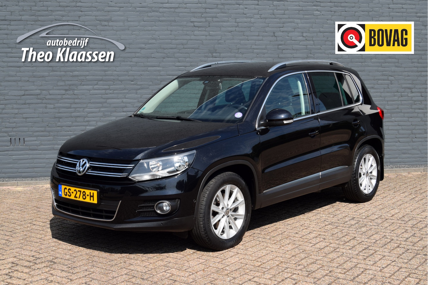 Volkswagen Tiguan - 1.4 TSI Sport&Style 1e eigenaar 99.00km NAP - AutoWereld.nl