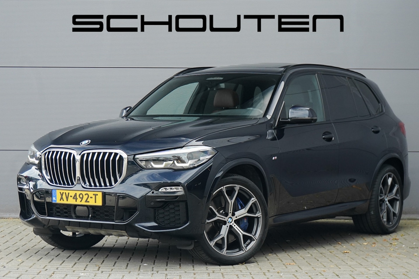 BMW X5 - xDrive40i High Ex Pano 4WS ACC Luchtvering H/K HUD NL Auto Trekhaak - AutoWereld.nl