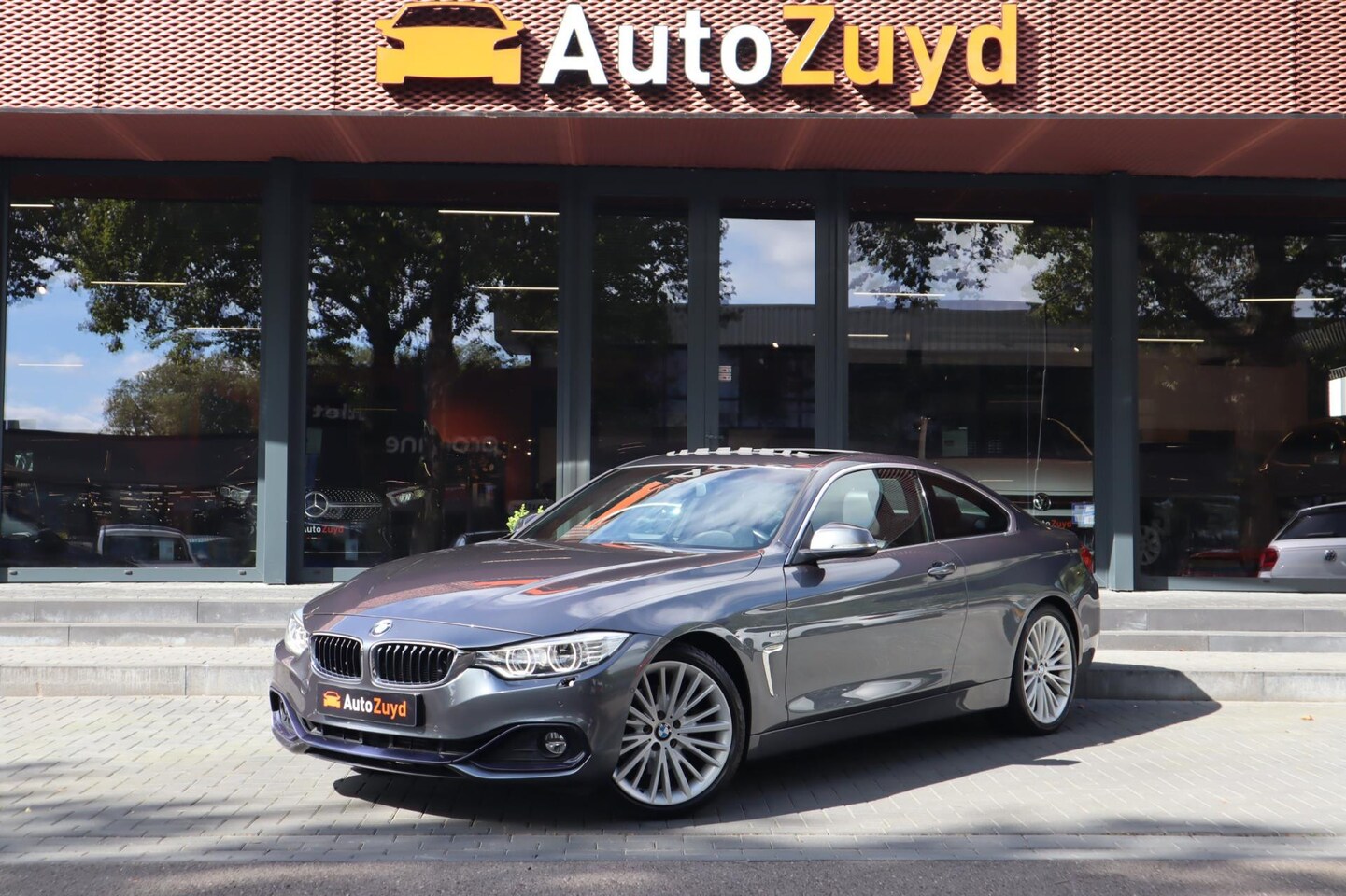 BMW 4-serie Coupé - 428i High Executive / Navi / Pano / Clima - AutoWereld.nl