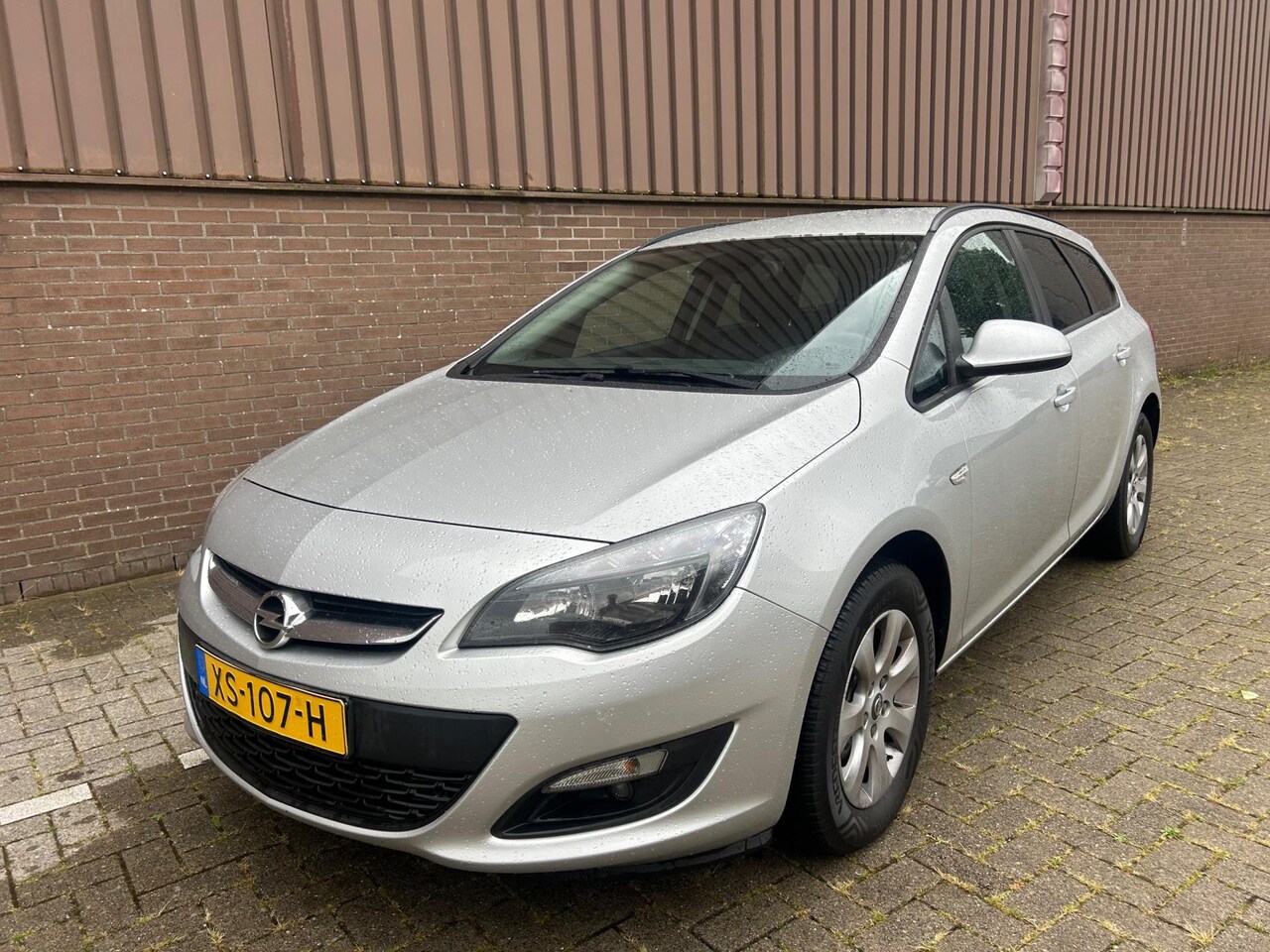 Opel Astra Sports Tourer - 1.6 CDTi Edition Navi PDC Cruise - AutoWereld.nl