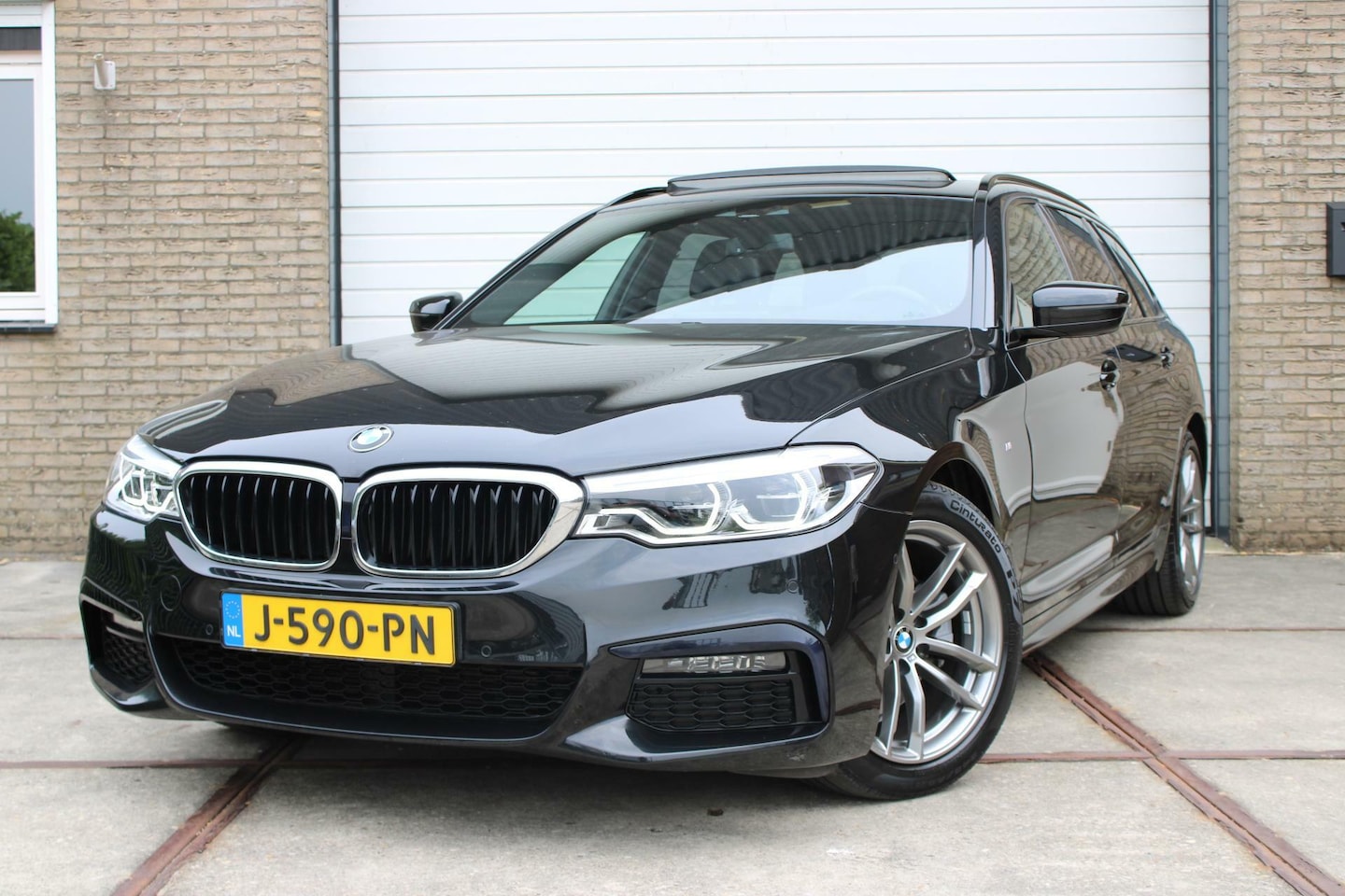 BMW 5-serie Touring - 520i High Executive M Sport Individual - AutoWereld.nl