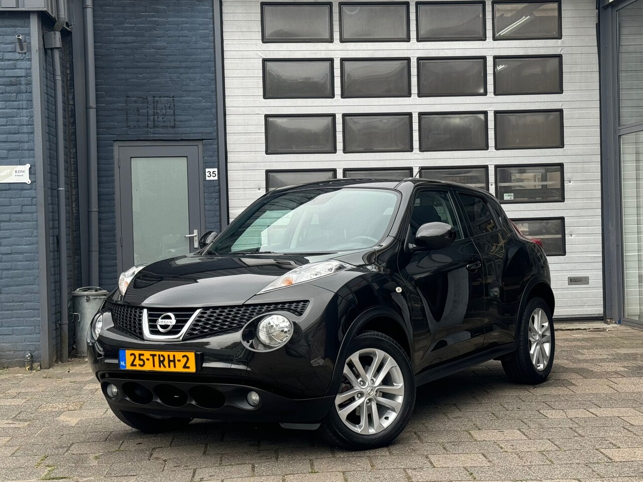 Nissan Juke - 1.6 Acenta | Clima | Cruise | LMV | N.A.P - AutoWereld.nl