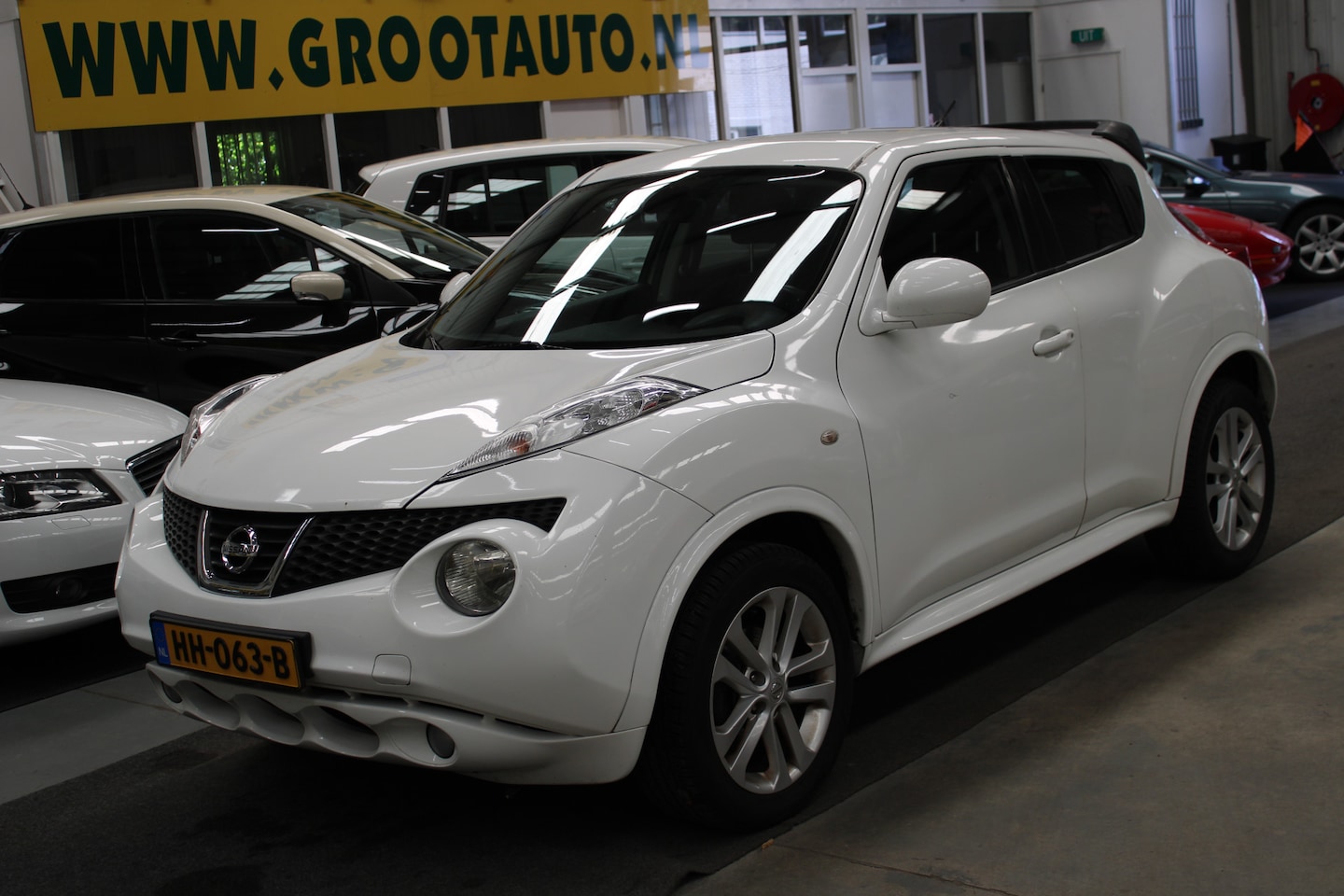 Nissan Juke - 1.6 Acenta Airco, Navi, Cruise control - AutoWereld.nl