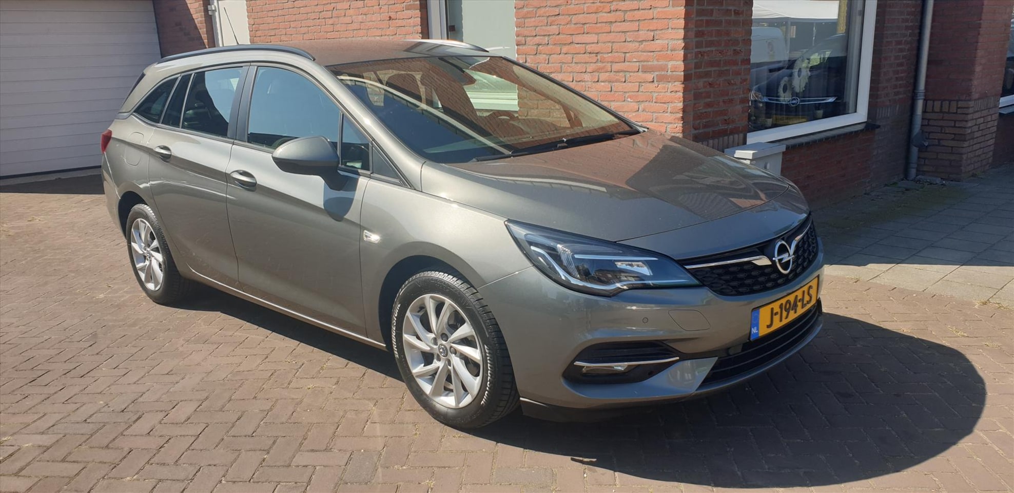 Opel Astra Sports Tourer - 1.2 Turbo 130pk Start/Stop Business Edition - AutoWereld.nl