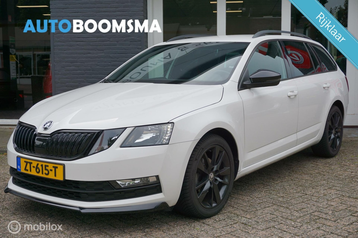 Skoda Octavia Combi - 1.6 TDI Sport DSG Clima Cruise Trekhaak - AutoWereld.nl