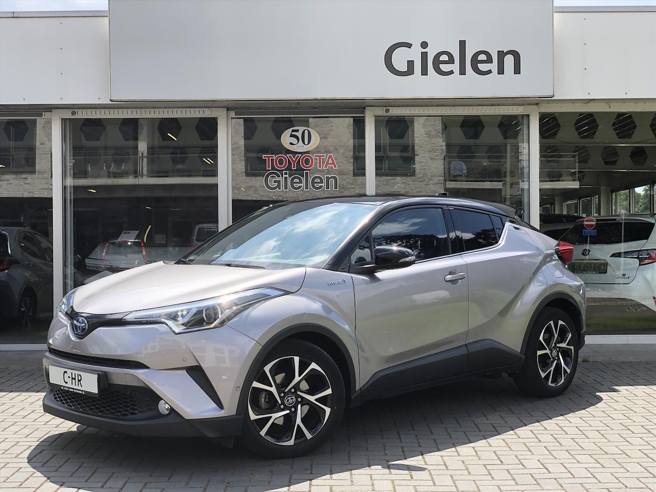 Toyota C-HR - 1.8 Hybrid Bi-Tone Plus | Eerste eigenaar, JBL, Dodehoekherkenning, Parkeersensoren, Stoel - AutoWereld.nl