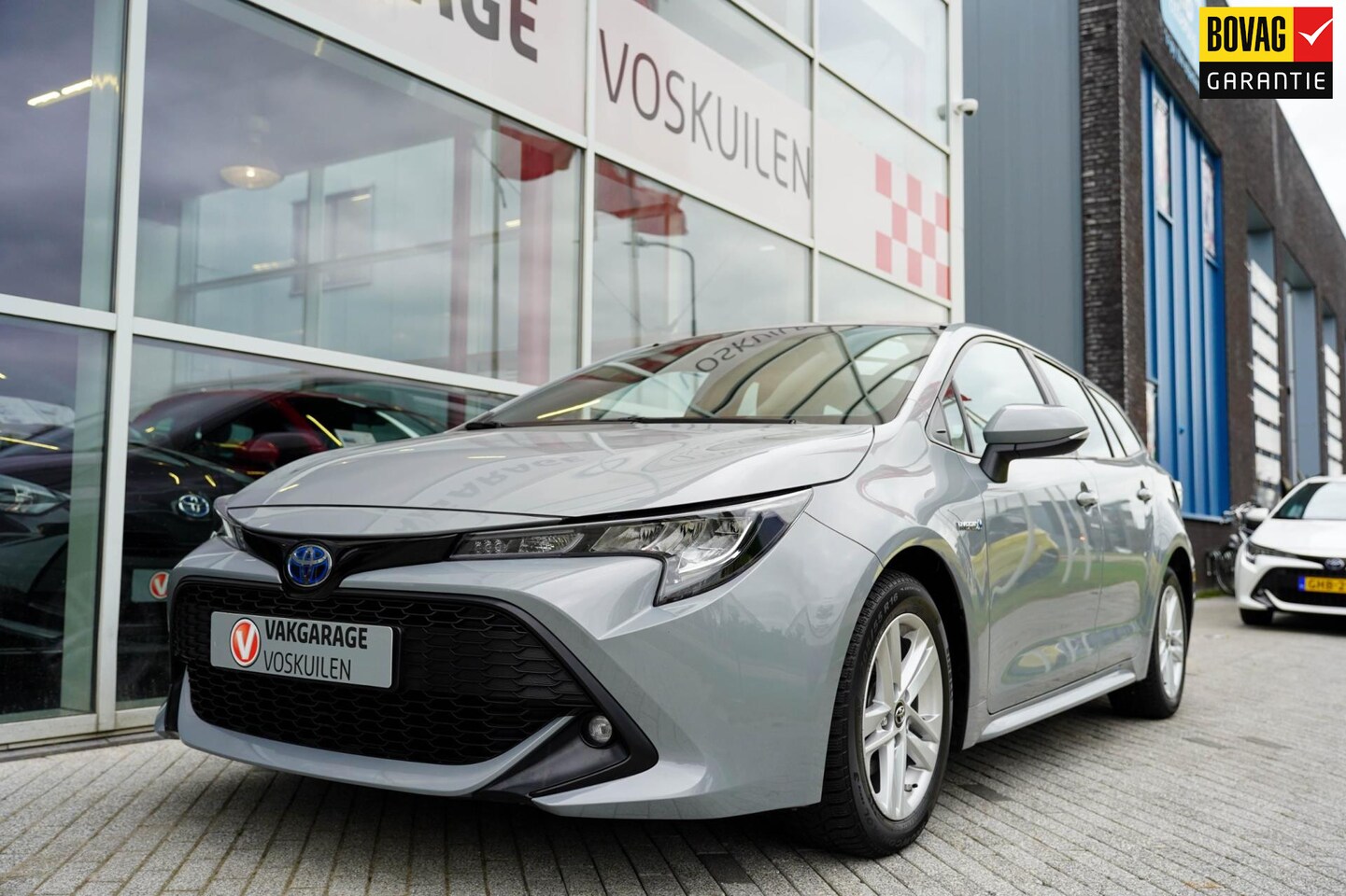 Toyota Corolla Touring Sports - 1.8 Hybrid Business |Apple Carplay| Navi | Camera - AutoWereld.nl