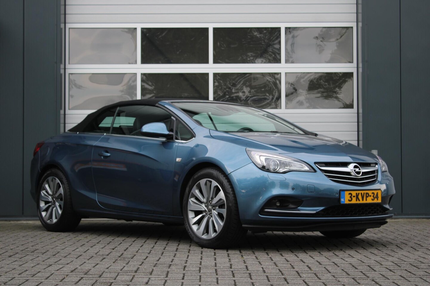 Opel Cascada - 1.4 Turbo ecoFLEX Cosmo Clima/Cruise/Multimedia/Navi/Leder/PDC/Stoelverwarming/Bi-Xenon/1e - AutoWereld.nl