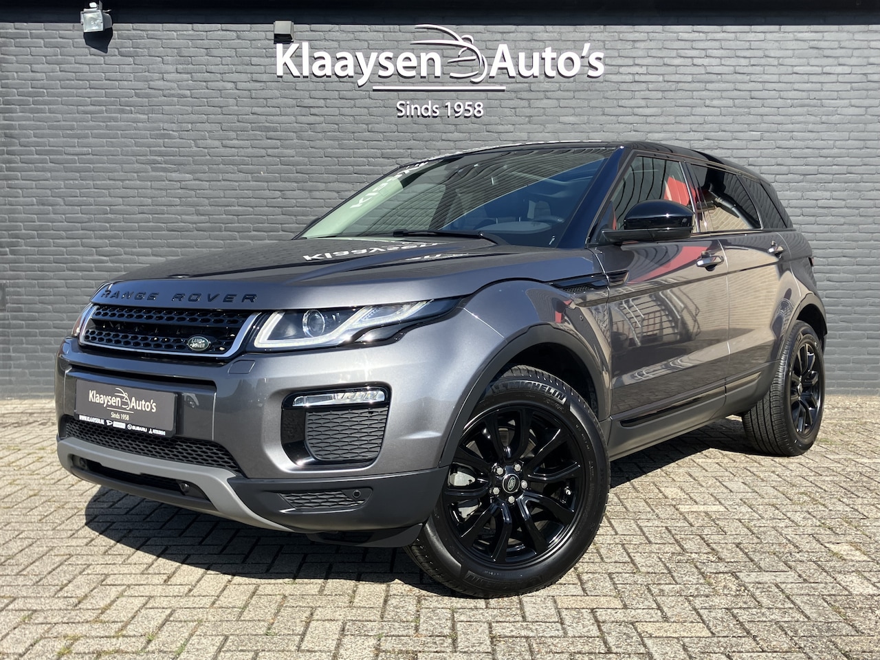 Land Rover Range Rover Evoque - 2.0 Si4 SE AWD AUT. | dealer onderhouden | navigatie | lederen interieur | cruise control - AutoWereld.nl