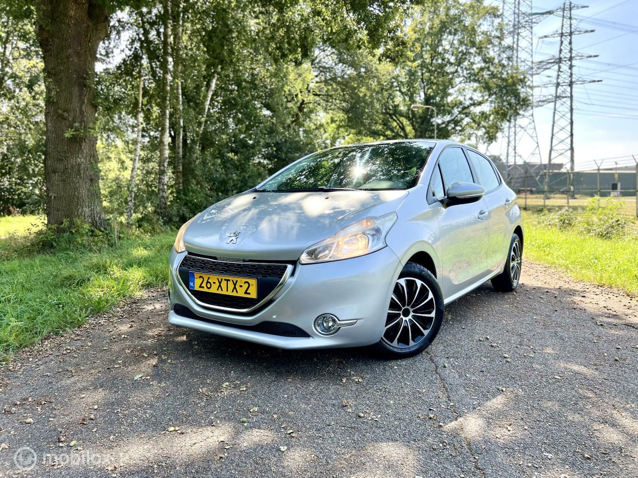 Peugeot 208 - 1.2 VTi Grijs 5drs Airco Touchscreen NAP ✅ - AutoWereld.nl