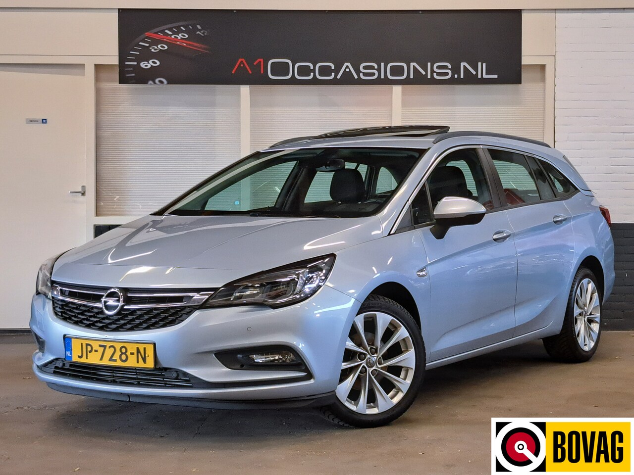 Opel Astra Sports Tourer - 1.0 Edition + NAVI + KANTELDAK !! - AutoWereld.nl