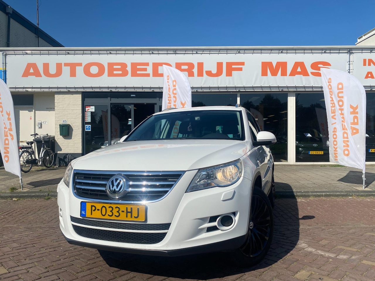 Volkswagen Tiguan - 2.0 TSI Comfort&Design 4Motion LPG Airco Cruise Control - AutoWereld.nl