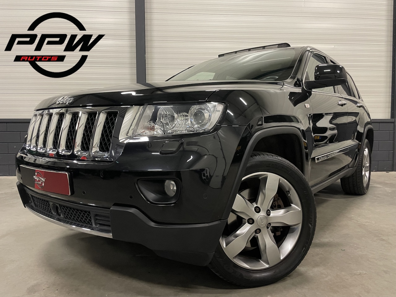 Jeep Grand Cherokee - 5.7 V8 Hemi Overland 353PK EDITION PANO/LUCHTVERING/LEER+VENTILATIE/CAMERA/XENON/KEYLESS/2 - AutoWereld.nl