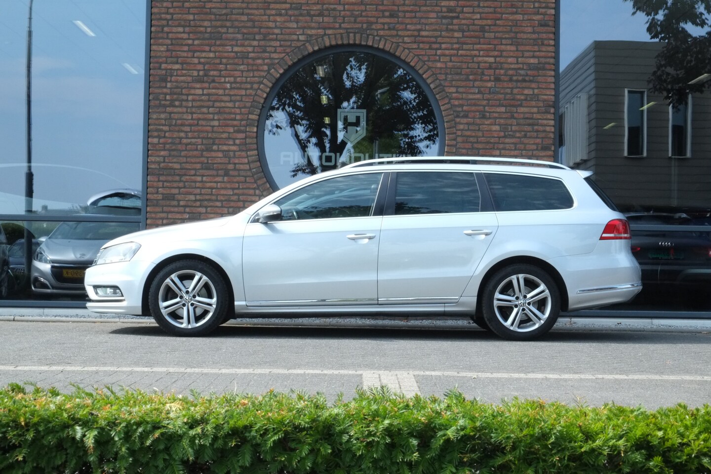 Volkswagen Passat Variant - 2.0 TDI R-line BlueMotion Panoramadak, Trekhaak, Leder - AutoWereld.nl