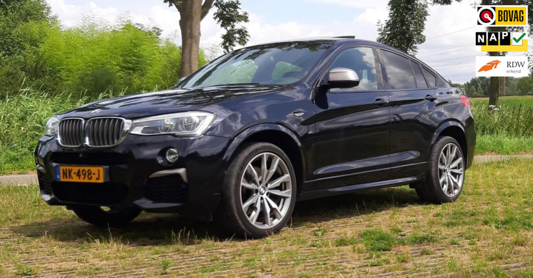 BMW X4 - M4.0i Centennial High Executive M40i Centennial High Executive - AutoWereld.nl