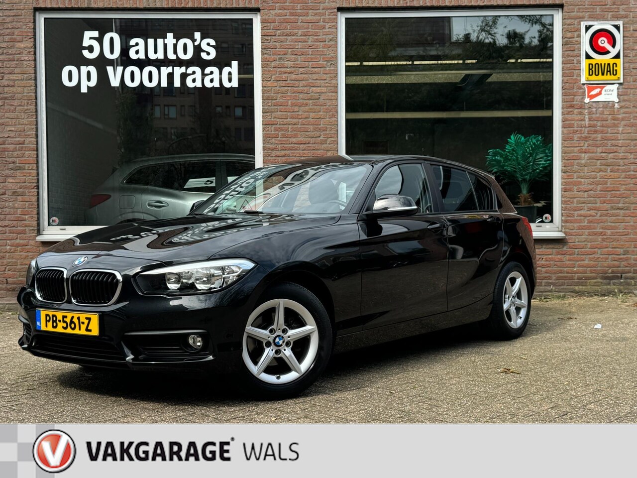 BMW 1-serie - 118i CORPORATE LEASE | NAVI | AUTOMAAT | CLIMA | VELGEN | PDC - AutoWereld.nl