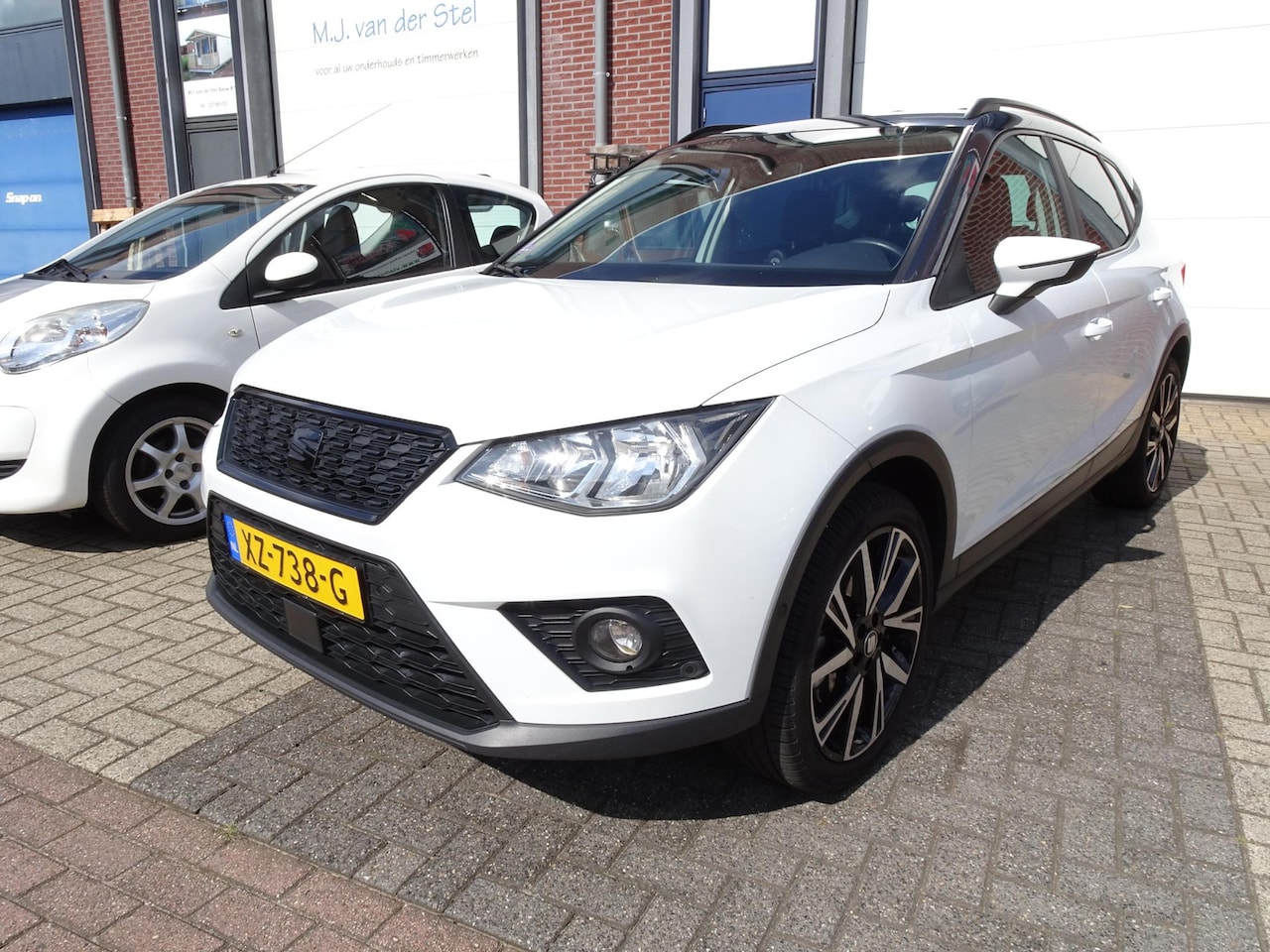 Seat Arona - 1.0 TSI Style Business Intense AUT l NAVI l Trekhaak - AutoWereld.nl