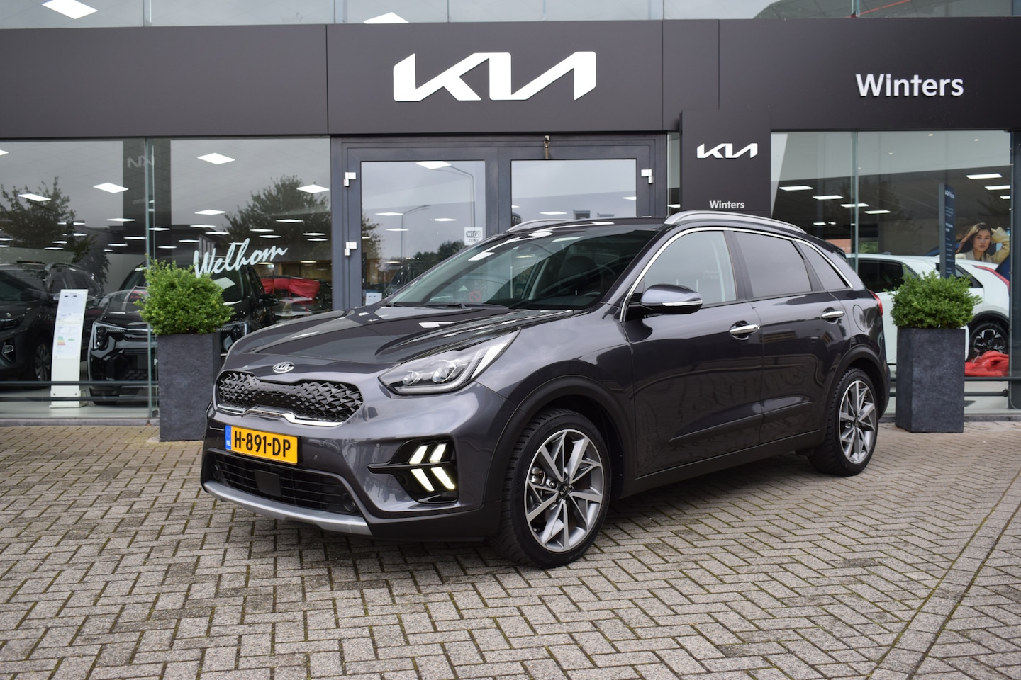 Kia Niro - 1.6i-16V Hybrid Style Edition DCT6/Autom. ECC Cr.Control-Adapt. Navi+Camera+BT Keyless Tre - AutoWereld.nl