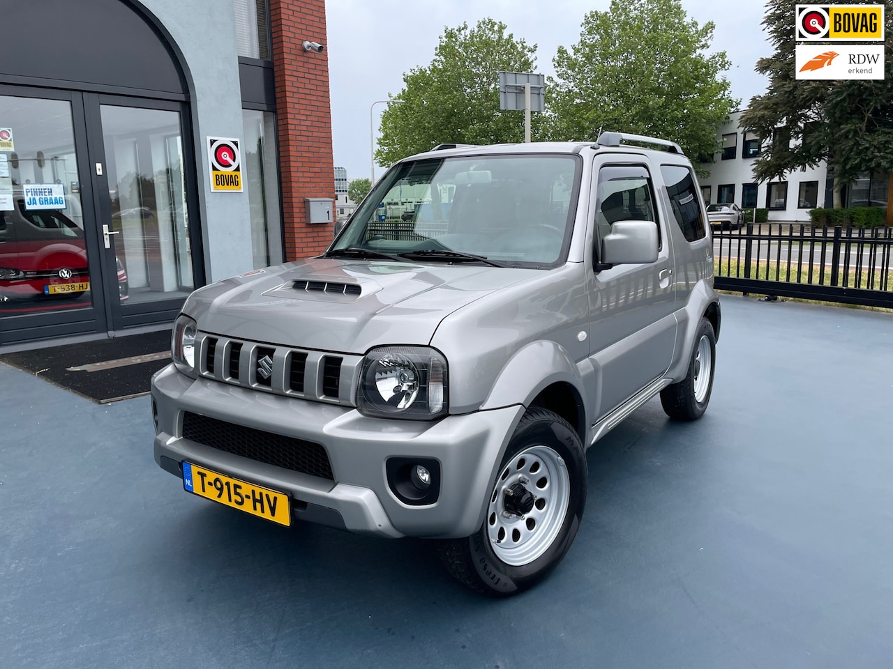 Suzuki Jimny - 1.3 Exclusive 4x4 LEER STOLEVERWARMING AIRCO - AutoWereld.nl