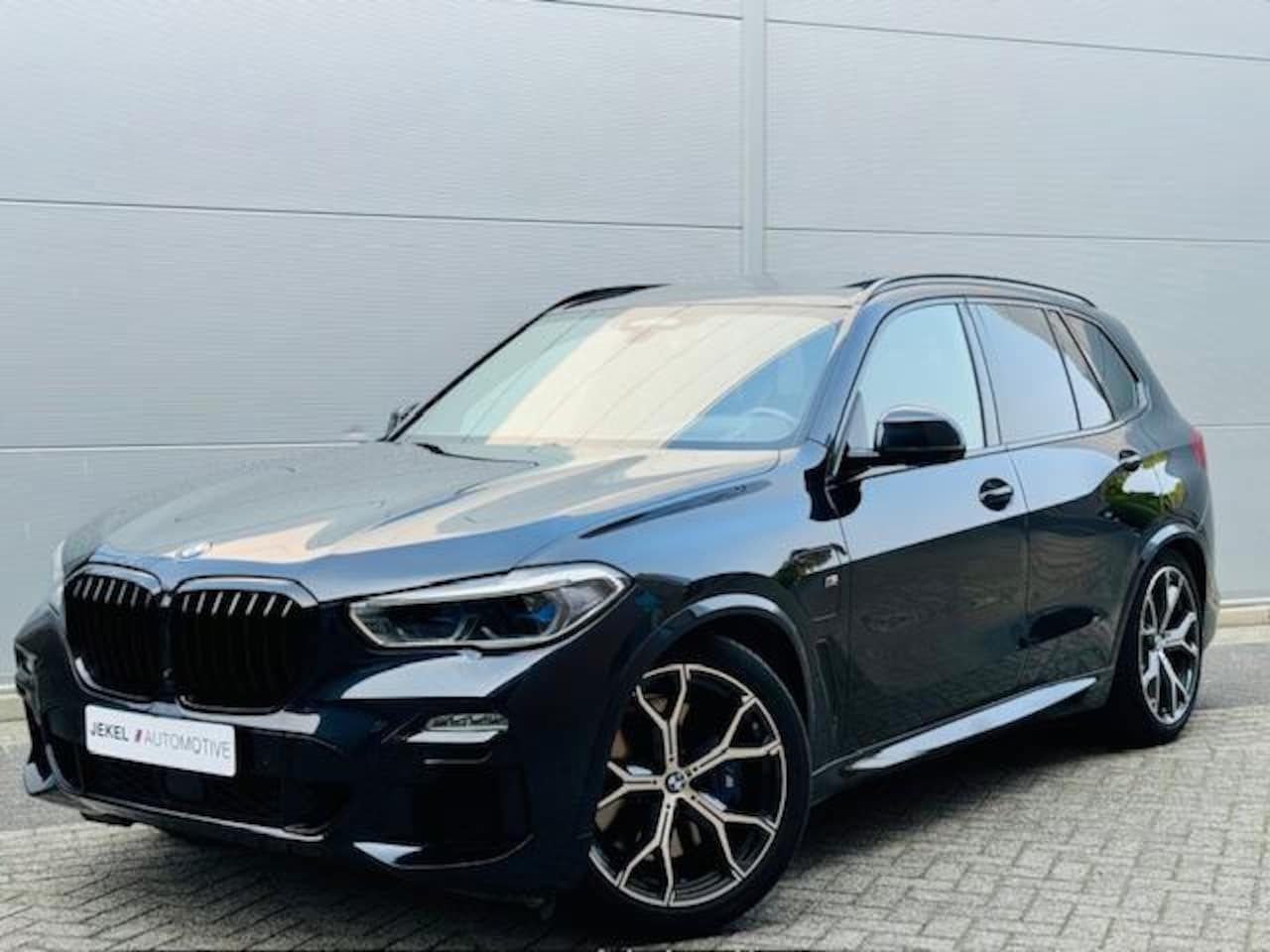 BMW X5 - xDrive45e M-Sport Pano, HUD, TH, 21", 360 Camera, enz - AutoWereld.nl