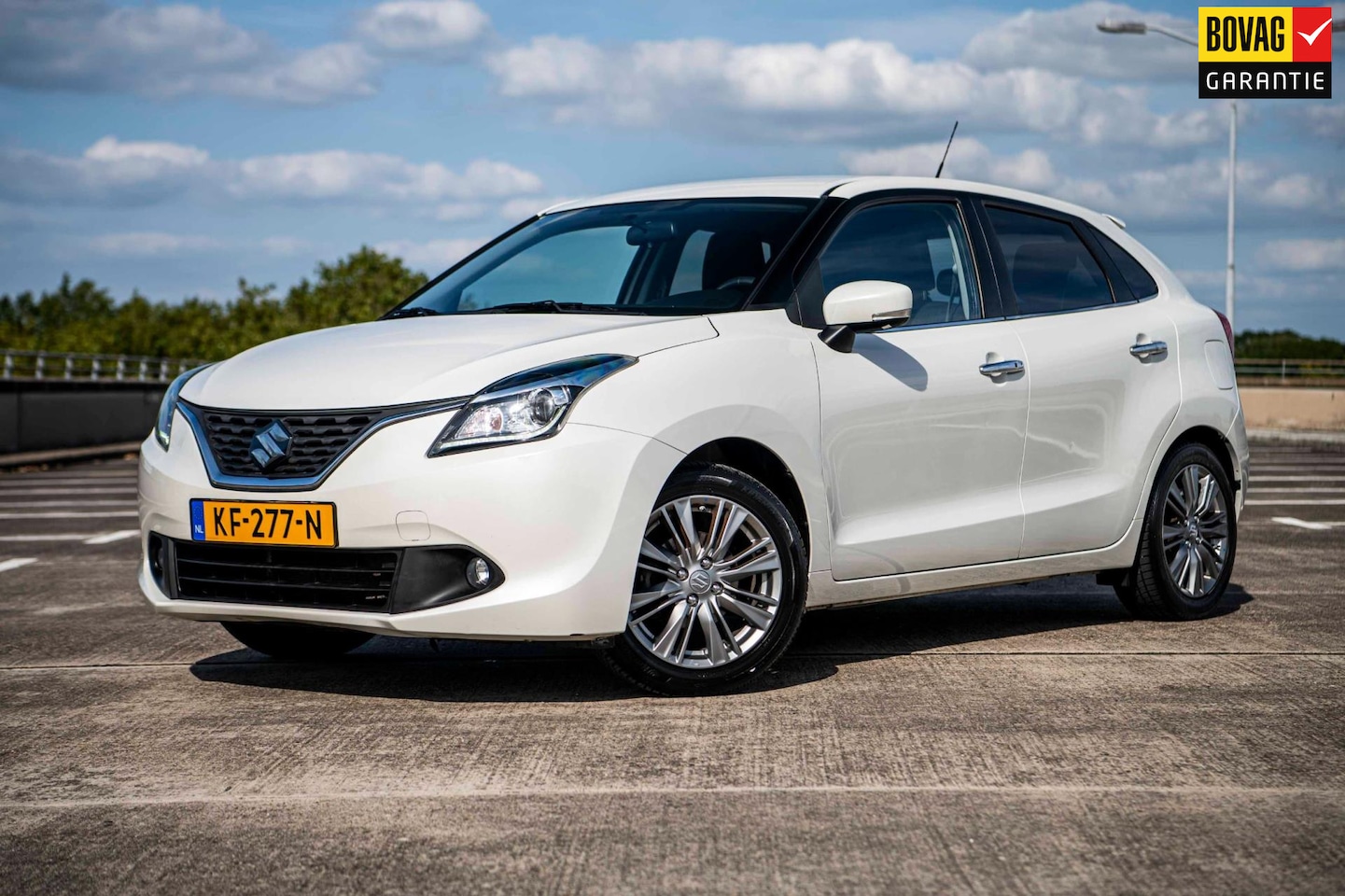 Suzuki Baleno - 1.2 90pk Smart Hybrid High Executive |Adaptieve Cruise | Trekhaak | Keyless| Xenon| Apple - AutoWereld.nl