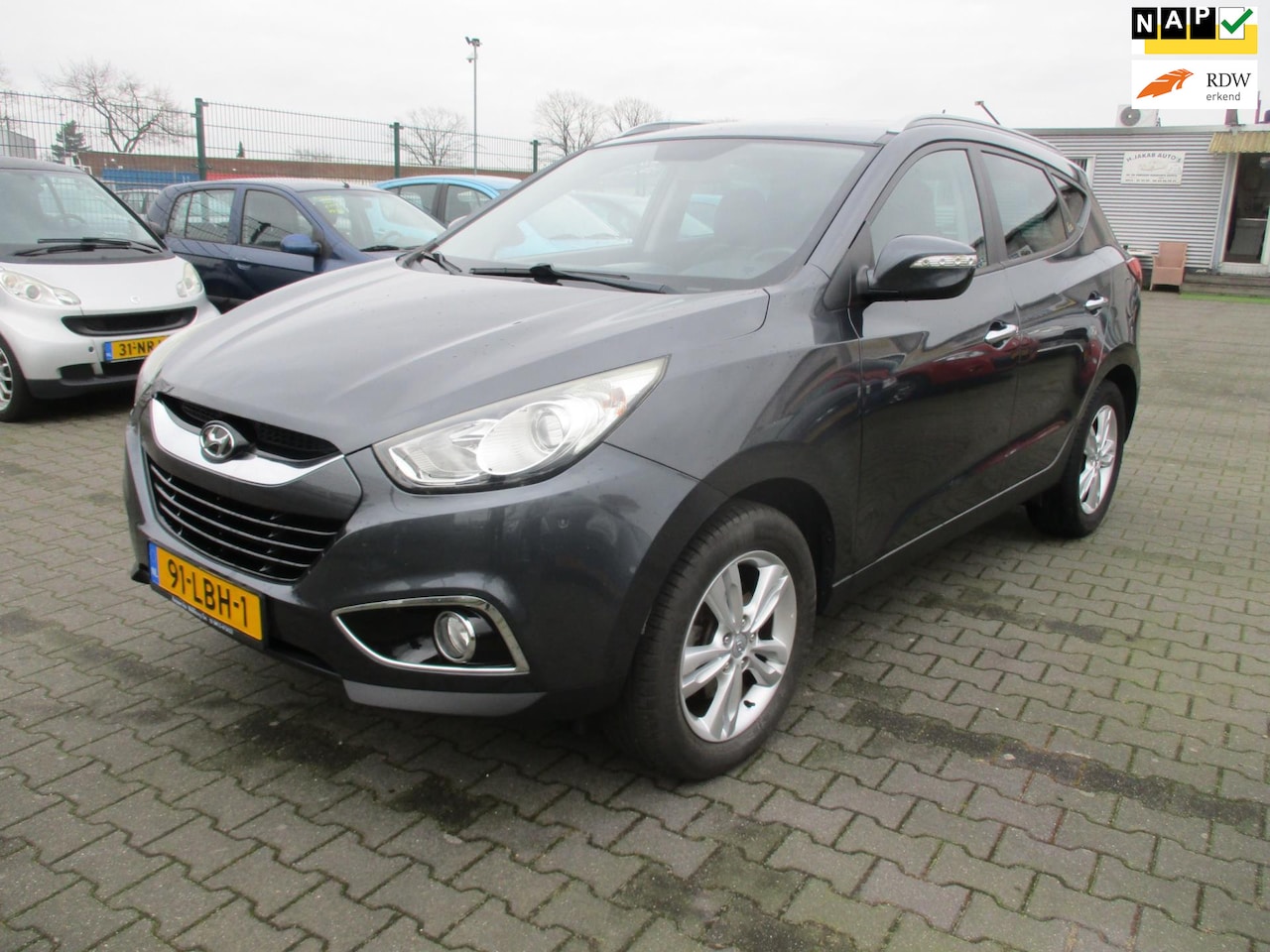 Hyundai ix35 - Hyundai Ix35 2.0i Style 5-DRS-AIRCO-CRUIS CONTR. - AutoWereld.nl