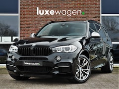 BMW X5 - M50d 381pk grijs kenteken Pano HUD H/K Trekh 20inch