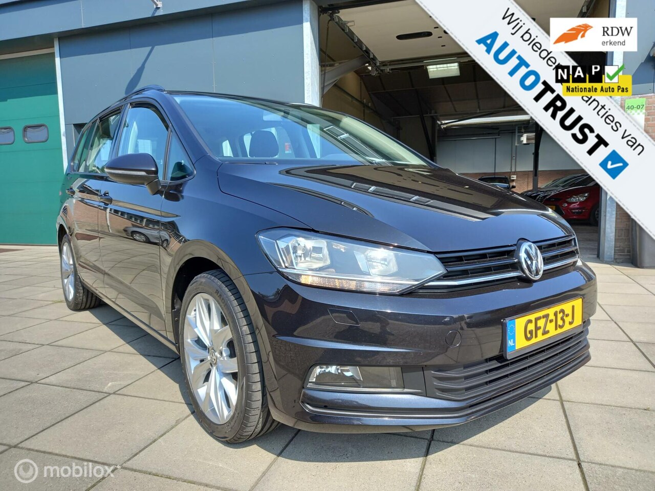 Volkswagen Touran - 1.2 TSI Comfortline/7p/Navi/Clima/garantie - AutoWereld.nl