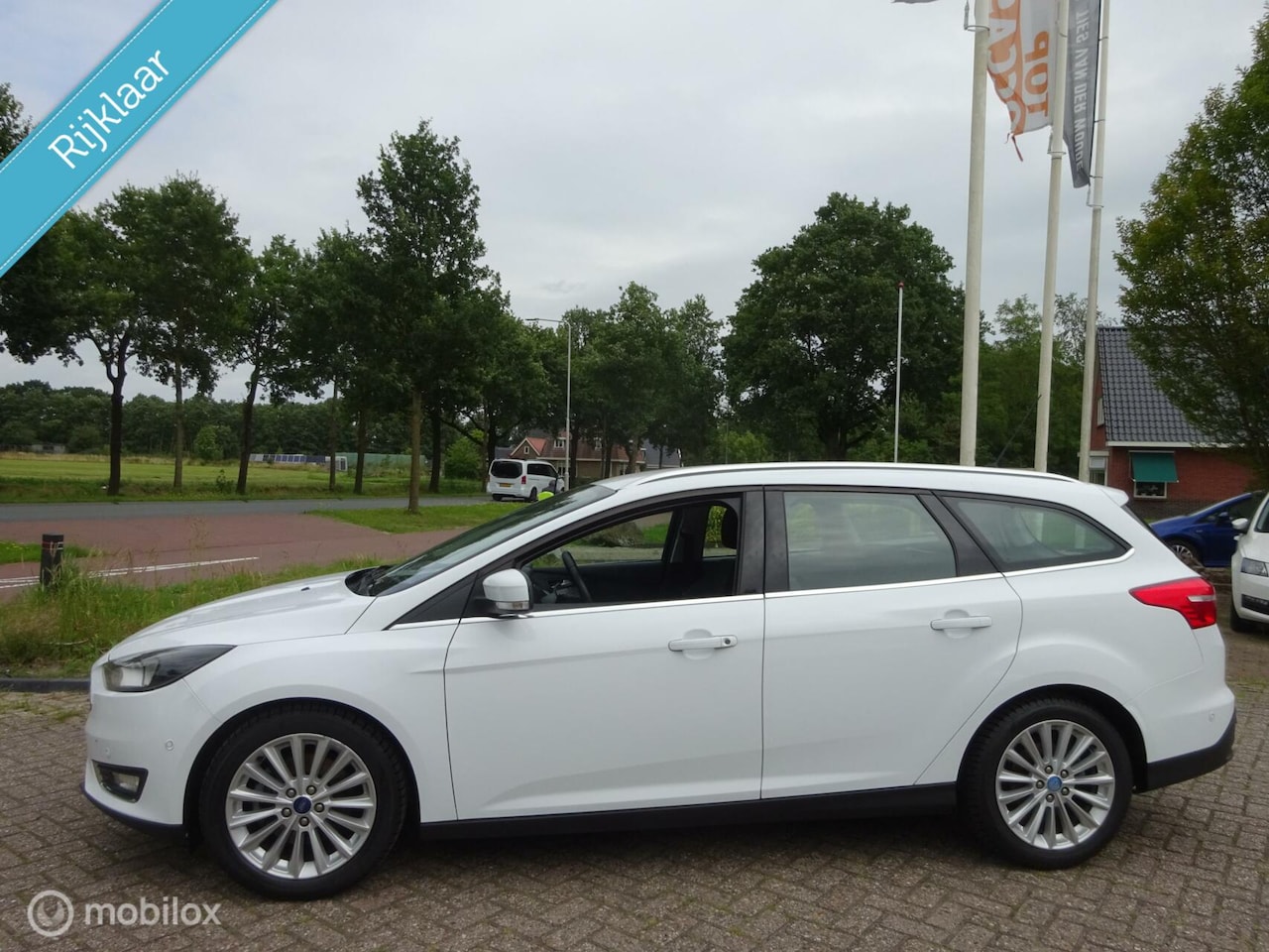 Ford Focus Wagon - 1.5 Titanium Edition '015 Clima|Navi|Cruise - AutoWereld.nl