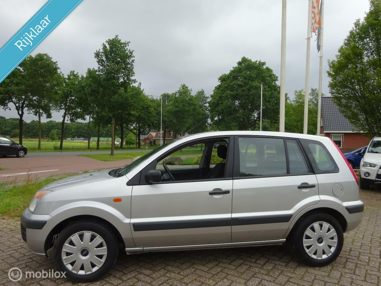 Ford Fusion - 1.4-16V Champion '06|Airco|49DKM!|Hoge instap! - AutoWereld.nl