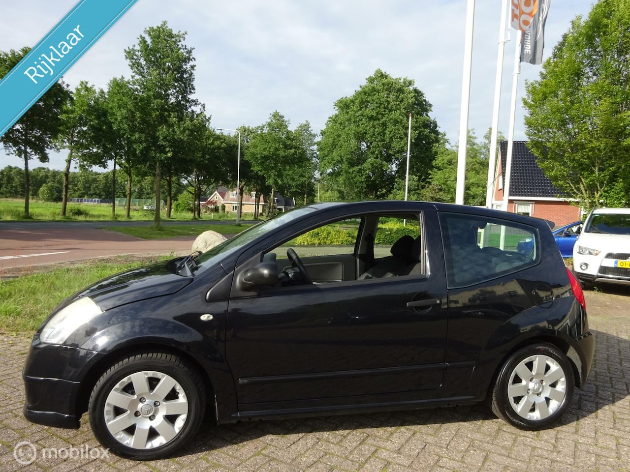 Citroën C2 - 1.4i Caractère '07 Sport|LM wielen|3-4-2025 APK! - AutoWereld.nl