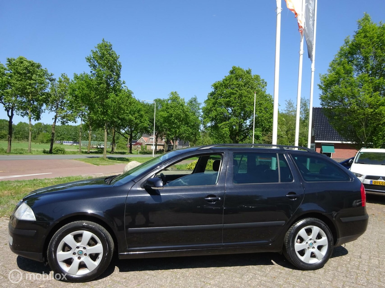 Skoda Octavia Combi - 1.8 TSI Ambiente '07 Airco|Cruise! - AutoWereld.nl