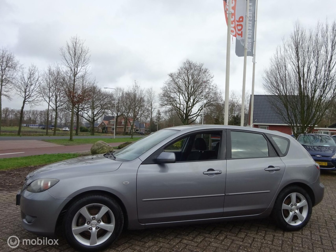 Mazda 3 Sport - 1.6 Touring Sportline 1.6 Touring Sportline 5DRS,"06 Airco|LM wielen - AutoWereld.nl