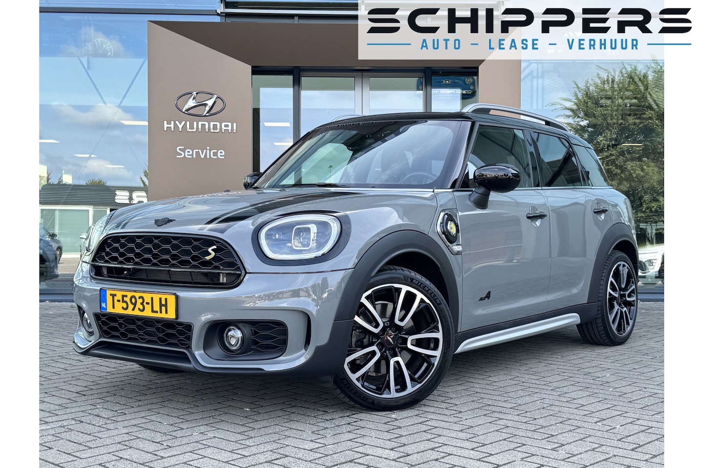 MINI Countryman - Mini 2.0 Cooper S E ALL4 John Cooper Works | Trekhaak | Voorstoelen verwarmd - AutoWereld.nl