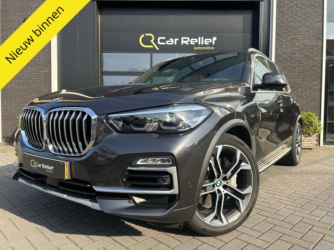 BMW X5 - xDrive45e High Executive |Luchtvering | Pano | Memory Seats | HuD | ACC | Trekhaak | - AutoWereld.nl