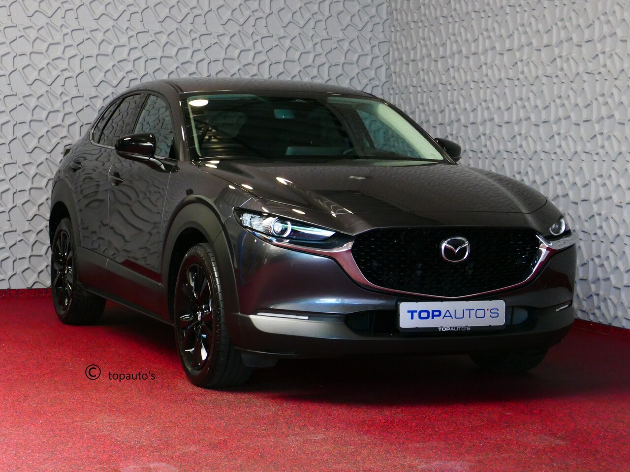 Mazda CX-30 - 2.0 E-SkyActiv-G 150 M HYBRID HOMURA STOELVERW CAMERA ELEK.KLEP BLINDSPOT HEADUP 04/2024 - AutoWereld.nl