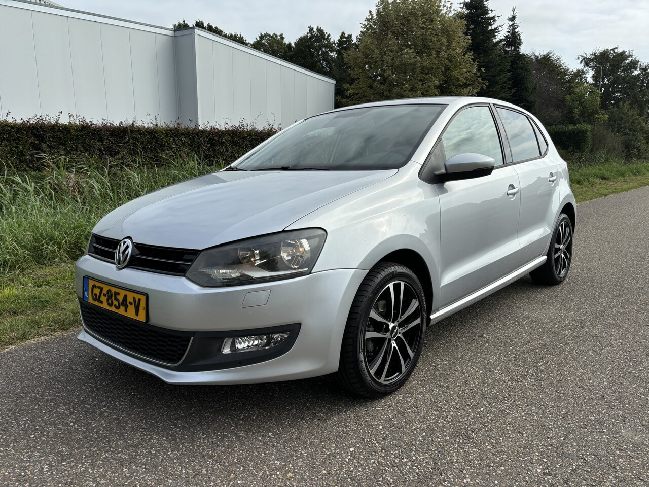 Volkswagen Polo - 1.2 TSI Edition / NAVI / STOELVERWARMING / CRUISE / AIRCO - AutoWereld.nl