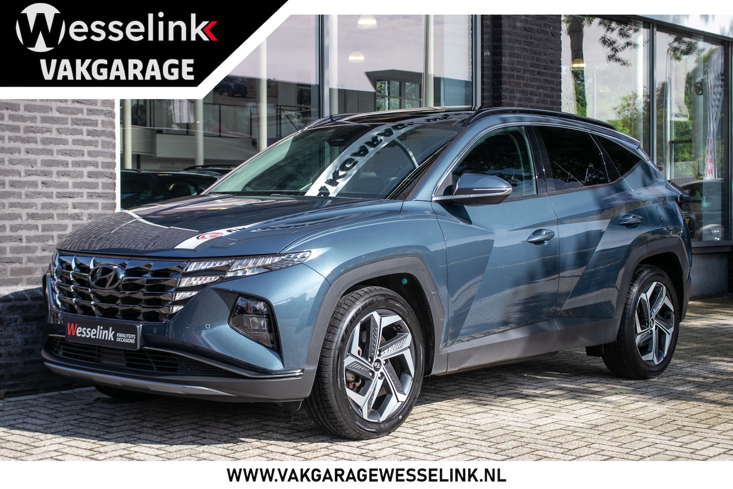 Hyundai Tucson - 1.6 T-GDI PHEV Comfort Sky 4WD - All-in rijklrprs | Schuif/-kanteldak | Navi | Cruise - AutoWereld.nl