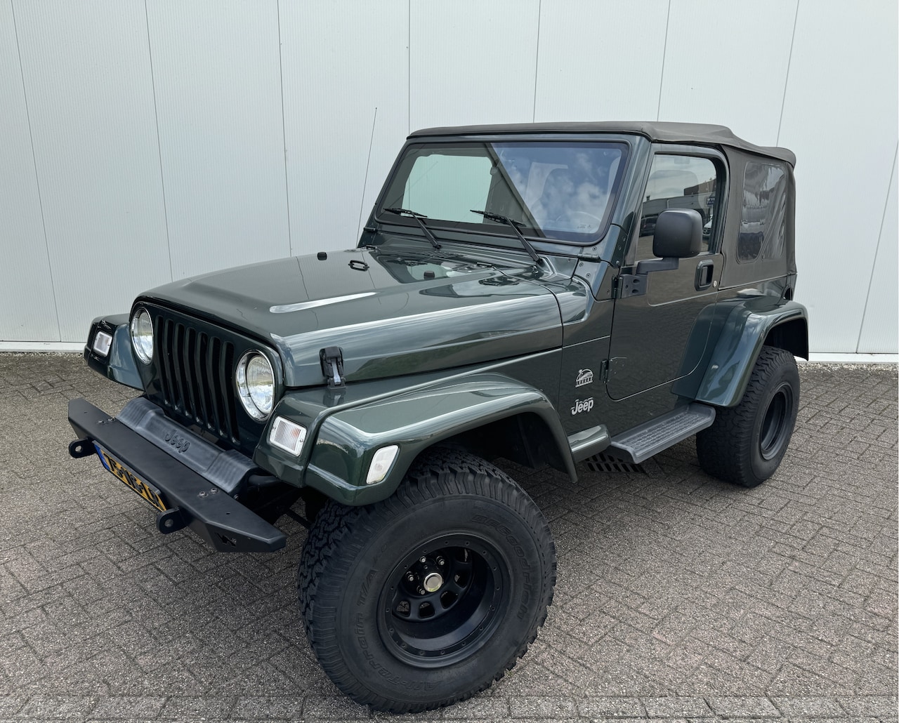 Jeep Wrangler - 4.0i Hardtop Sahara AIRCO - AutoWereld.nl